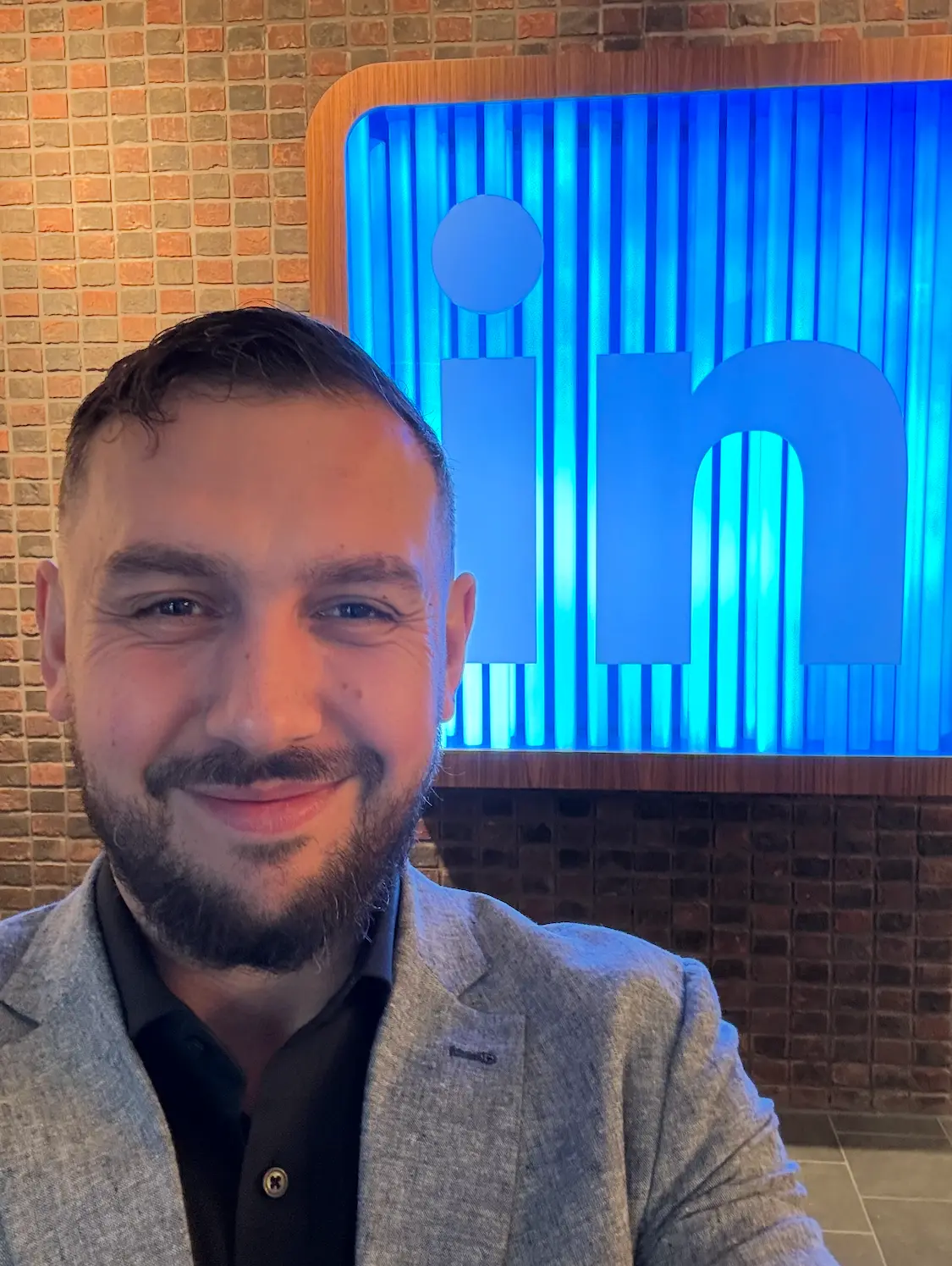 Daniel Disney in front of a LinkedIn sign